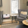 Pheonix Wi-FI heater mounted on wall in sitting room